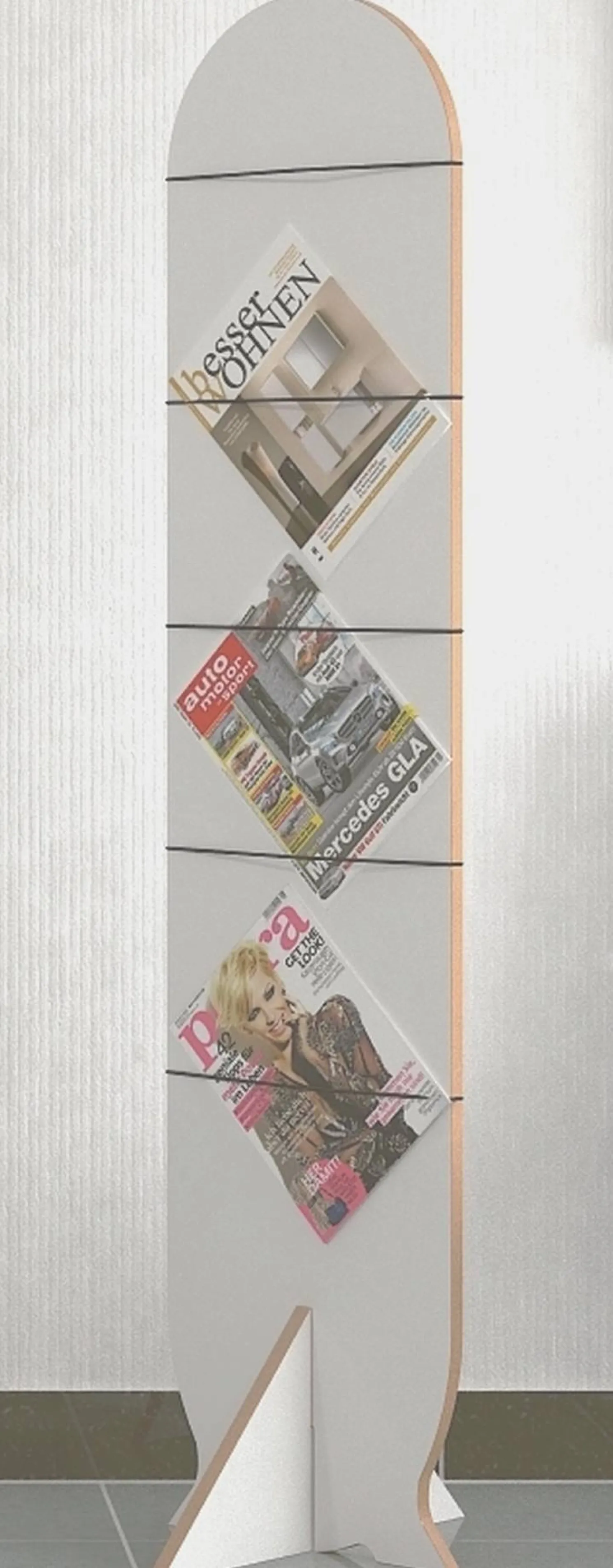 Tojo Magazzi Zeitungsständer